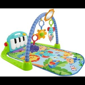 Used Fisher price kick and play piano gym